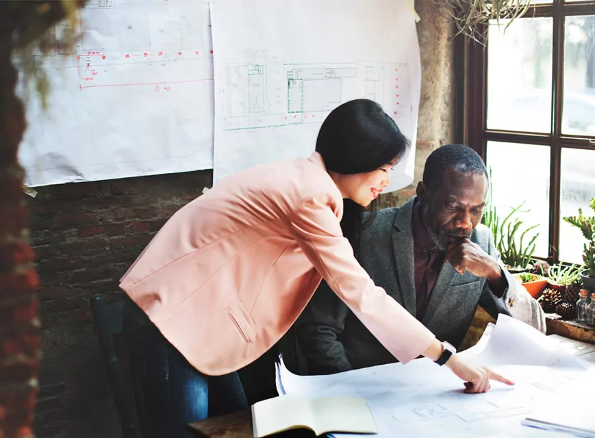 Showcasing custom stucco mouldings to a client